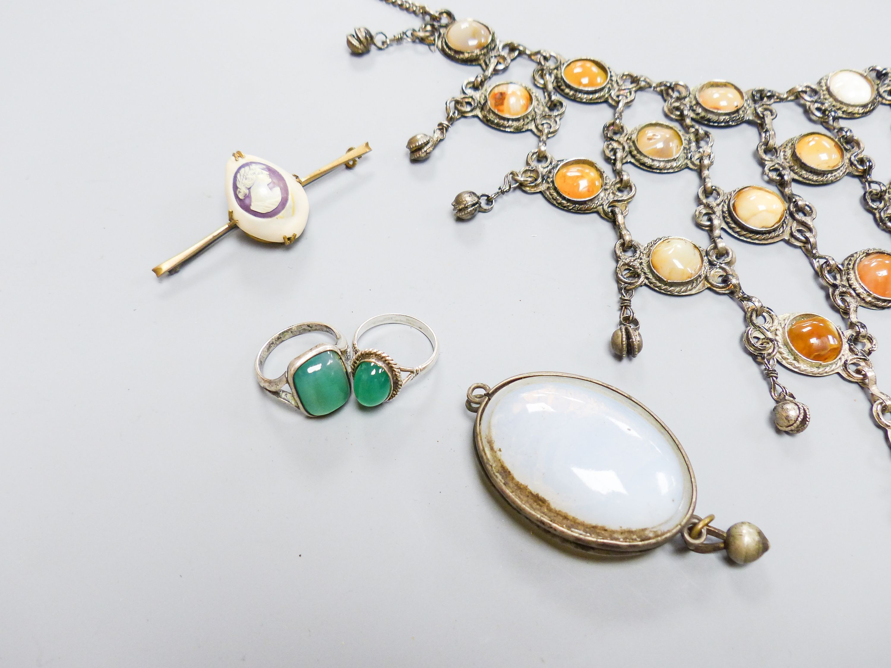 A base metal and agate mounted necklace and other costume jewellery.
